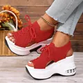 Side view of red knitted wedge platform sandals on feet showing breathable sport fabric - 35 / Red