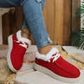 Detailed side view of red corduroy winter loafers with warm white faux fur lining - 36 / Red