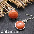 Minimalist round goldstone dangle hook earrings featuring shimmering reddish-brown stones - Gold Sandstone