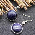 Round blue goldstone dangle earrings with silver-tone fish hooks for elegant look - Blue Sandstone