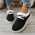 Casual black warm snow boots featuring white faux fur lining and lace-up design on wood - 36 / Black