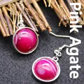 Elegant round drop earrings featuring pink striped agate stones with silver hooks - Pink Agate