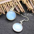 Minimalist silver hook earrings with round opalite stones, elegantly designed for daily wear. - Opal