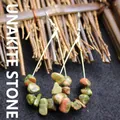 Handmade unakite stone chip drop earrings with metallic hooks in a rustic design - Unakite