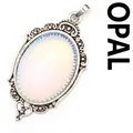 Vintage silver-tone oval opal pendant necklace featuring an ornate carved frame - Pendant Only / Opal