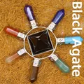 Healing black agate crystal pyramid ornament with seven chakra points on gold straw - Black Agate