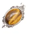 Exquisite vintage oval tiger's eye stone pendant with a decorative silver-toned filigree frame - Pendant Only / Tiger's Eye