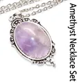 Vintage oval purple crystal pendant necklace with ornate silver-tone metal border. - Pendant And Chain / Amethyst