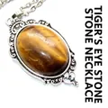 Vintage style oval tiger eye gemstone pendant necklace with ornate silver frame - Pendant And Chain / Tiger's Eye