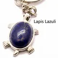 Detailed turtle shaped pendant keychain with oval Lapis Lazuli stone inlay in silver metal - Lapis Lazuli