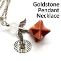 Merkaba star angel wing necklace with gold sandstone pendant and decorative clear bead - Angel Merkaba Necklace / Gold Sandstone