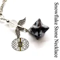Snowflake obsidian merkaba star pendant necklace with angel wing charms and clear bead. - Angel Merkaba Necklace / Snowflake Obsidian