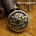 Zen yoga lotus figure pendant necklace featuring a round brown Tiger's Eye gemstone inlay - Tiger's Eye