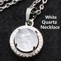 Collier élégant de ton argent avec un pendentif rond en cristal blanc et en strass - Collier avec Pendentif (Avec Chaîne) / Cristal blanc
