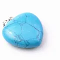 Ciondolo a forma di cuore in pietra blu venata con gancio argentato in vista SKU - Turchese blu
