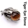 Detailed view of a vintage dragon claw pendant holding a natural tiger eye stone bead. - Pendant Only / Tiger's Eye