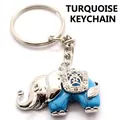 Olifant sleutelhanger in zilveren afwerking met turquoise steen en fonkelende kristallen - Blauw Turkoois