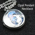 Gedetailleerde holle maan en fee medaillon ketting met synthetische opaalsteen hanger - Hanger met Ketting / Opaal