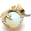 Exquisite gold-plated dragon claw pendant holding a round white opal gemstone bead - Opal