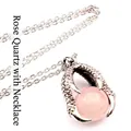 Detailed view of medieval dragon claw pendant necklace with a pink bead - Pendant Necklace / Rose Quartz