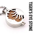 Halsketting met holle zon- en maanmedaillon hanger met natuurlijke tijgeroog steen inleg - Tijgeroog