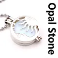 Halsketting met holle zon en maan medaillon en lichtblauwe opaliet steen op bolletjesketting - Opaal