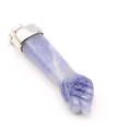 Detailed close-up view of fist-shaped blue natural stone pendant with silver bail. - Blue Aventurine