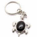 Elegante portachiavi a forma di tartaruga color argento con agata nera ovale lucidata. - Portachiavi / Agata nera