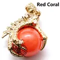 Exquisite golden dragon claw pendant necklace with a polished round red bead center stone. - Red Jade