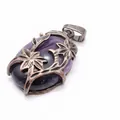 Retro purple amethyst pendant necklace featuring an antique bronze flower filigree design - Amethyst