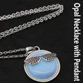 Stylish light blue round opal pendant necklace featuring black rhinestone sunglasses - With Necklace / Opal
