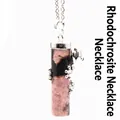 Natural rhodonite stone cylinder pendant necklace with silver-tone dragon wrap detail - Rhodonite
