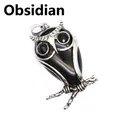 Colgante de búho de obsidiana con marco de metal plateado y ojos de piedra facetada negra - Obsidiana