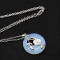 Opalite donut pendant necklace with silver floral decorative details - Necklace Set / Opal