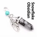 Snowflake obsidian hexagonal crystal pendant in black and white with feather charm - Snowflake Obsidian
