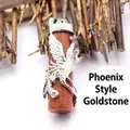 Phoenix engraved goldstone pendant with silver metal wrap for ethnic style jewelry. - Phoenix Style / Gold Sandstone