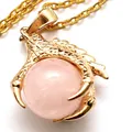 Gold dragon claw pendant necklace featuring a polished round pink crystal stone - With Necklace / Rose Quartz