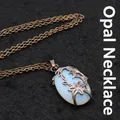 Vintage medieval bronze double flower pendant necklace featuring an oval blue opalite stone - Pendant With Chain / Opal