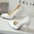 Detailed view of elegant white patent leather pointed-toe stiletto high heels shoes - 34 / 7CM Heel / White Red Bottom