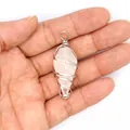 Elegant white crystal hexagonal cone pendant with an intricate silver wire wrap design - White Crystal