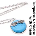 Individual turquoise round pendant necklace featuring a black rhinestone sunglasses motif - With Necklace / Blue Turquoise