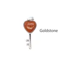 Elegant heart shaped brown goldstone key pendant with a polished silver tone finish - Gold Sandstone