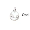 Elegant silver-toned dolphin and wave pendant necklace with a white opal gemstone inlay - Opal