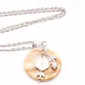 Silver chain necklace featuring round stone pendant with delicate white shell flower - Necklace Set / Orange Shell