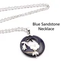 Elegant blue sandstone donut pendant necklace with white flower detail - Necklace Set / Blue Sandstone