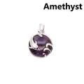 Elegant amethyst crystal pendant necklace featuring a silver dolphin playing in waves - Amethyst