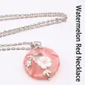 Elegant watermelon red crystal donut pendant necklace with white flower detail - Necklace Set / Watermelon red