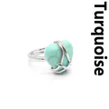 Elegant silver-toned ring featuring a heart-shaped turquoise stone with marble pattern - Turquoise
