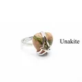 Silver heart ring featuring a natural unakite stone with unique green and pink patterns - Unakite