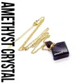 Elegant gold-plated chain necklace featuring a diamond-shaped purple amethyst perfume bottle pendant. - Amethyst